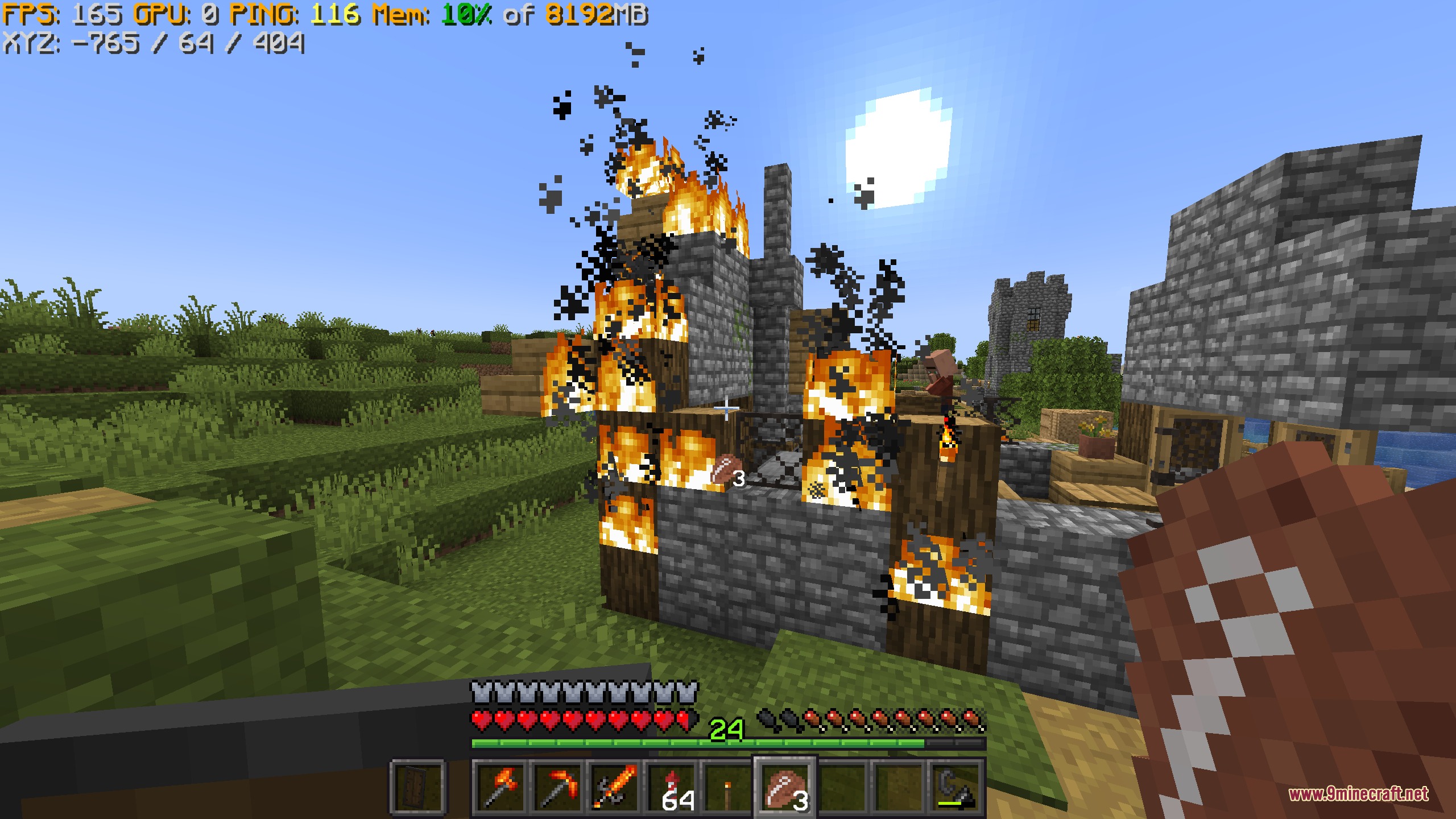 Vivid Interface Designer Mod Screenshot 3 Player holding raw beef while a village house burns with custom HUD stats
