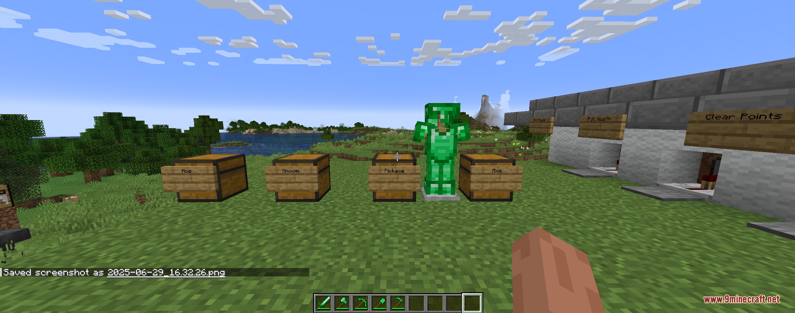 Vivid Verdant Arsenal Mod Screenshot 8 Emerald armor on a stand next to labeled chests in a grassy field