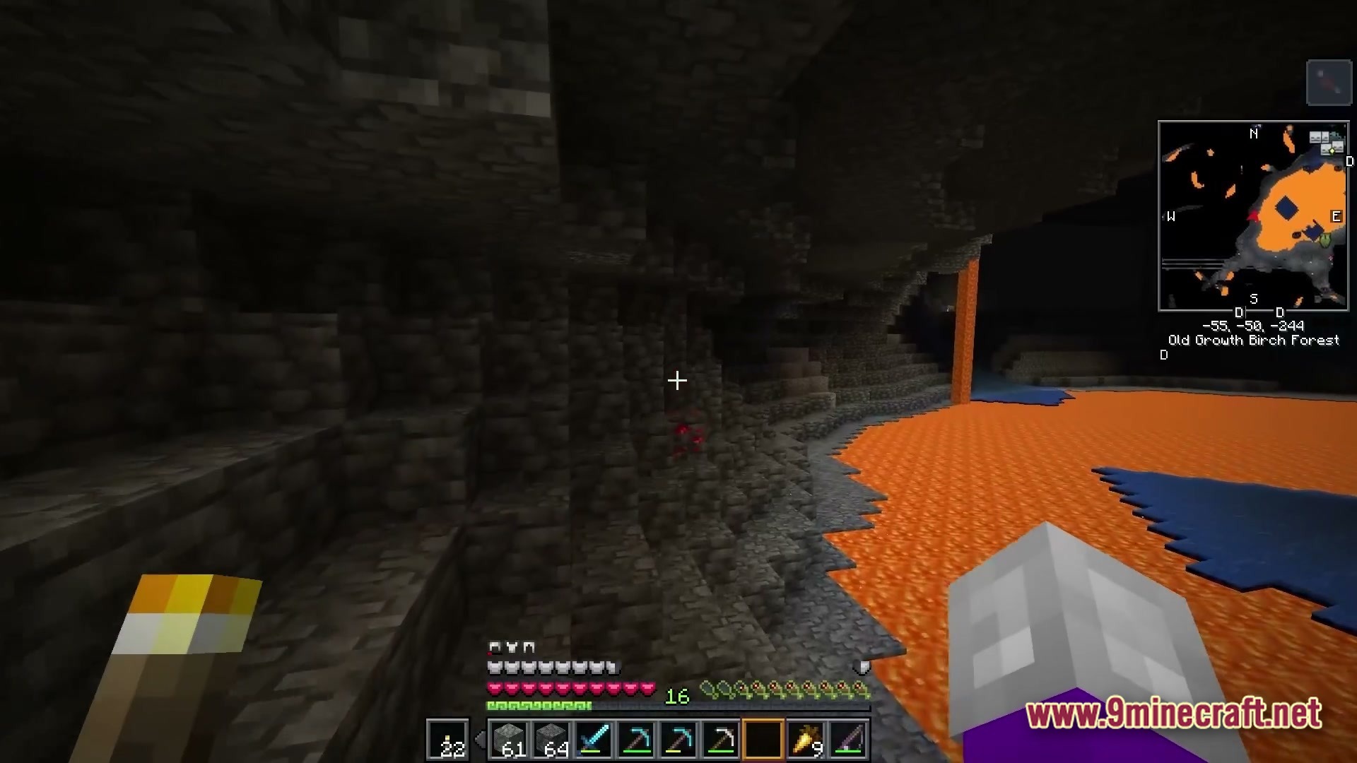 Vividia Horizon Modpack Screenshot 3 A player explores a deep underground cave featuring a large lava lake and stone cliffs