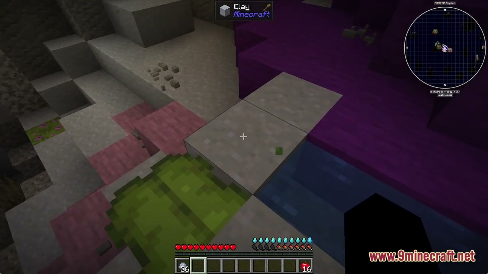 Voidlock Genesis Overdrive Modpack Screenshot 2 A player stands near clay and purple blocks in a cave with a mini-map displayed