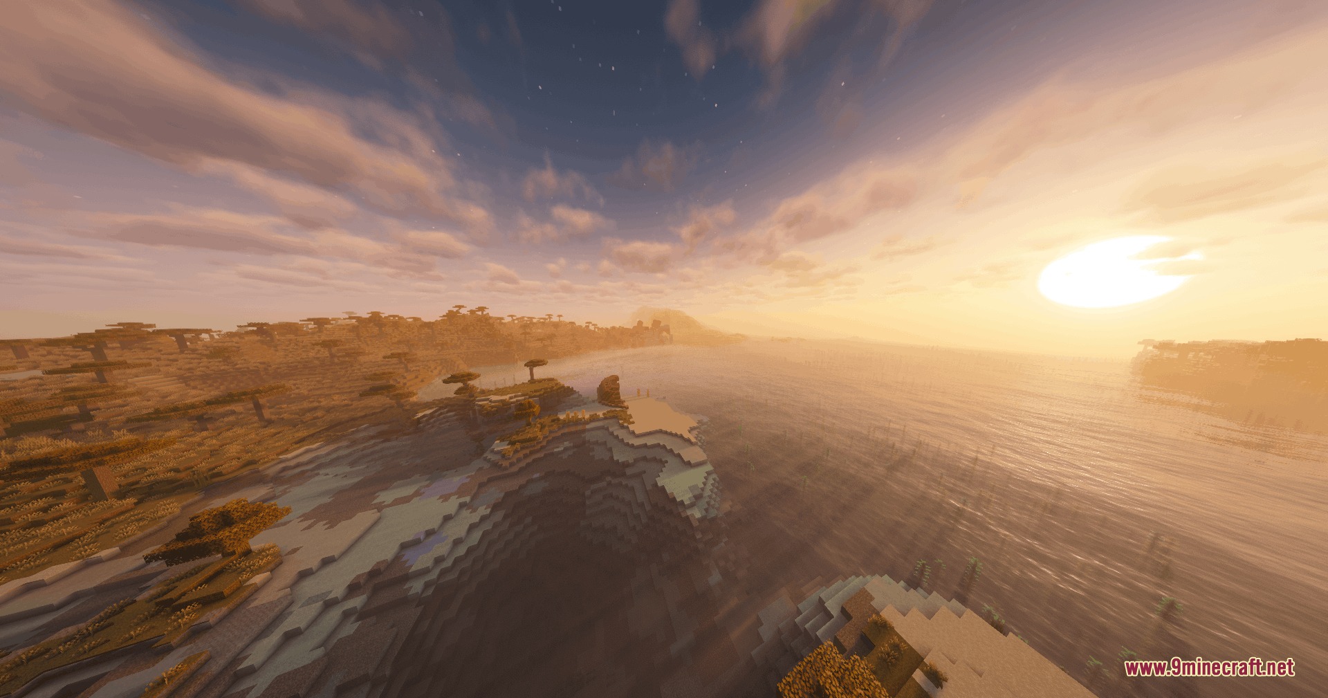 Vulkanic Light Engine Mod Screenshot 4 Coastal savanna landscape with realistic water reflections under a colorful sunset sky