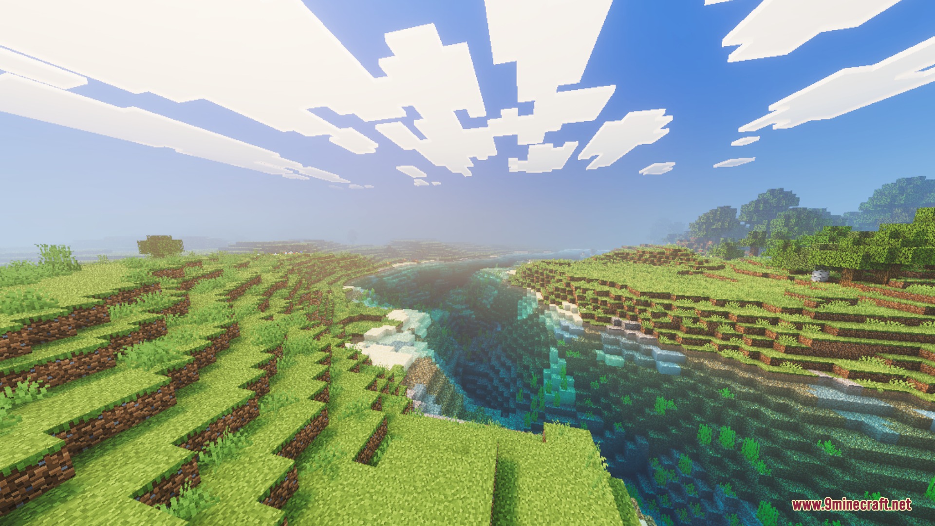Lush green hills and a river under a bright sky with volumetric sunbeams