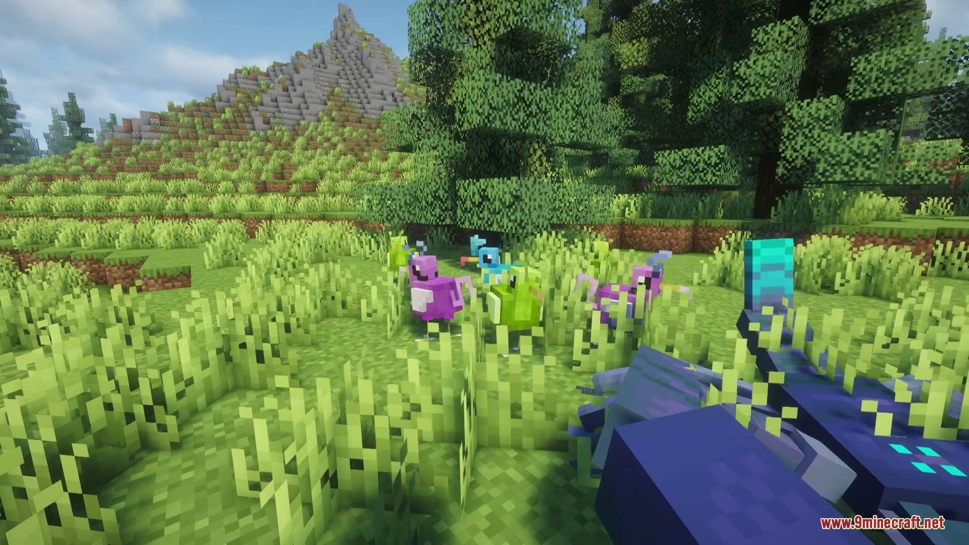 Weird and Wonderful Unusual Prehistory 2 Addon Mod Screenshot 7 Small colorful Proapteryx birds standing in a grassy field with tall trees