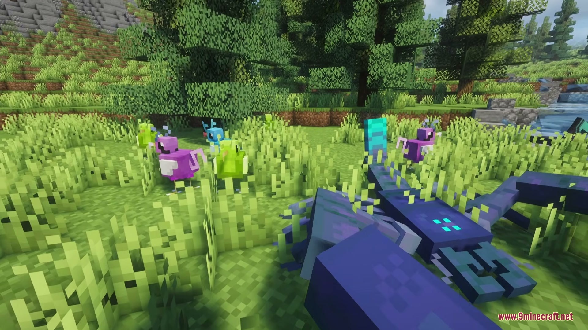Weird and Wonderful Unusual Prehistory 2 Addon Mod Screenshot 8 Colorful ancient birds wandering through tall grass near a large blue creature