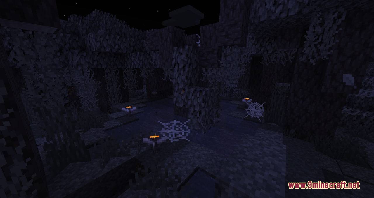 Small glowing structures and cobwebs scattered throughout the dark Pale Garden biome