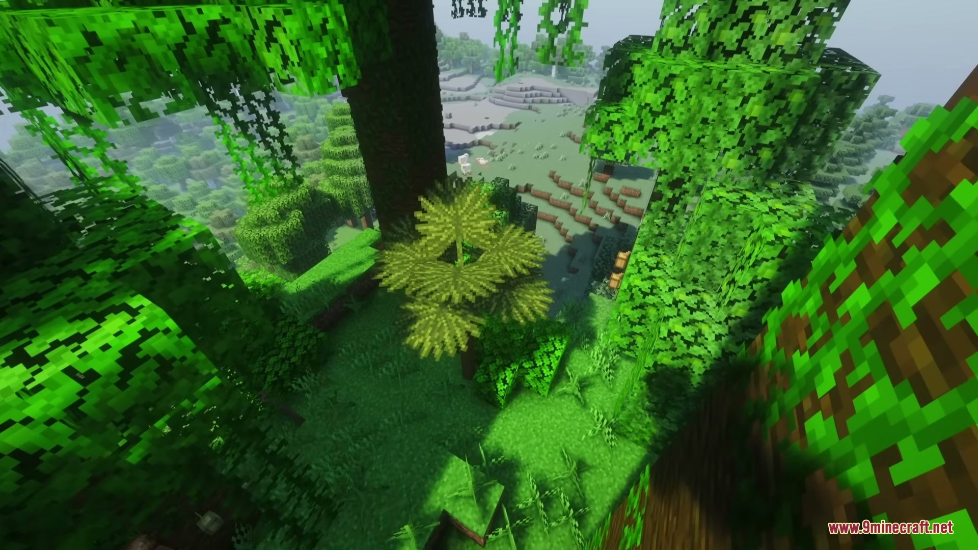 Wild Flora Mod Screenshot 4 Large fan palms and vines decorating a lush tropical jungle biome landscape