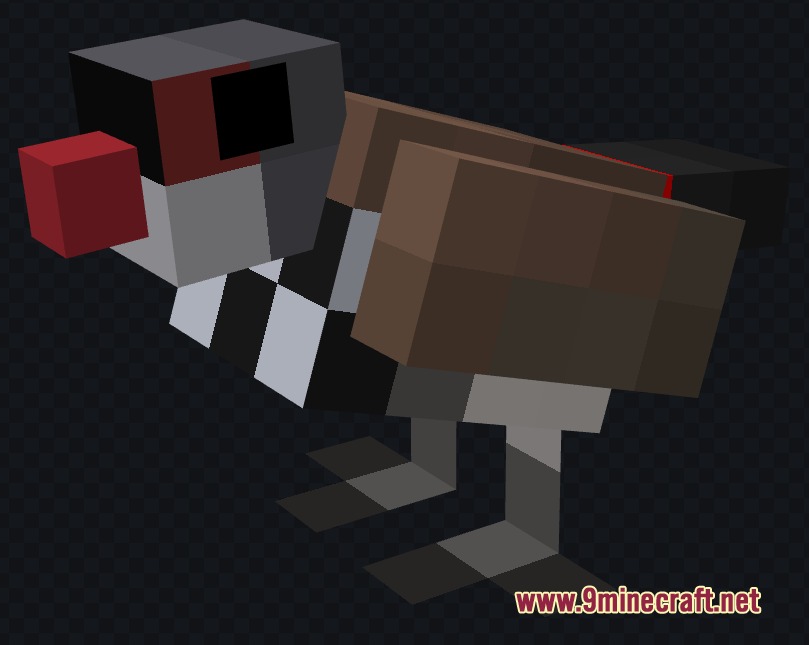 A small blocky bird mob with a red beak and brown wings