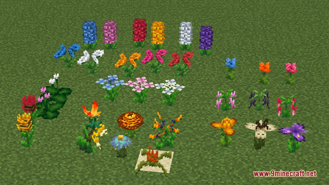 A collection of colorful custom flowers and tall plants on a field