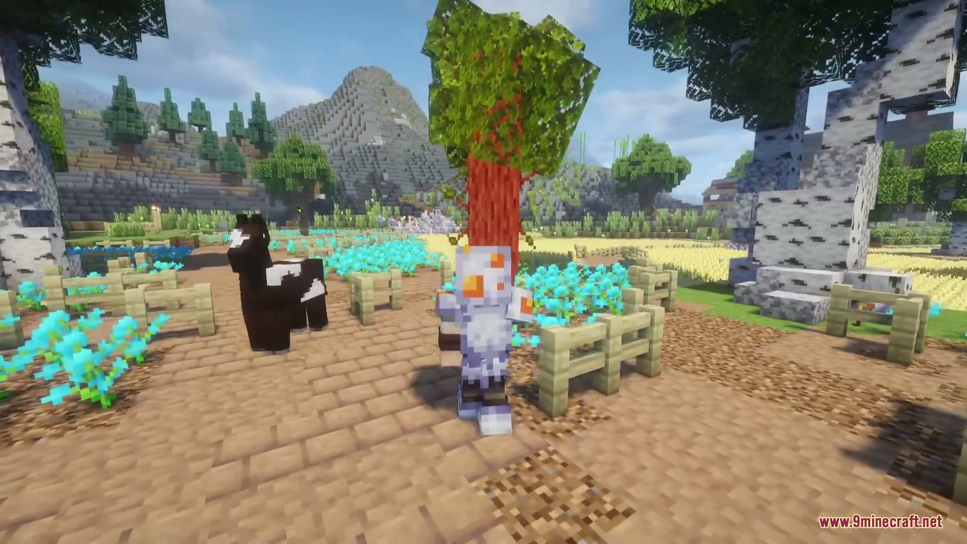Wildspawn Chaos Mod Screenshot 7 Player wearing specialized armor stands near a custom mob in a vibrant landscape