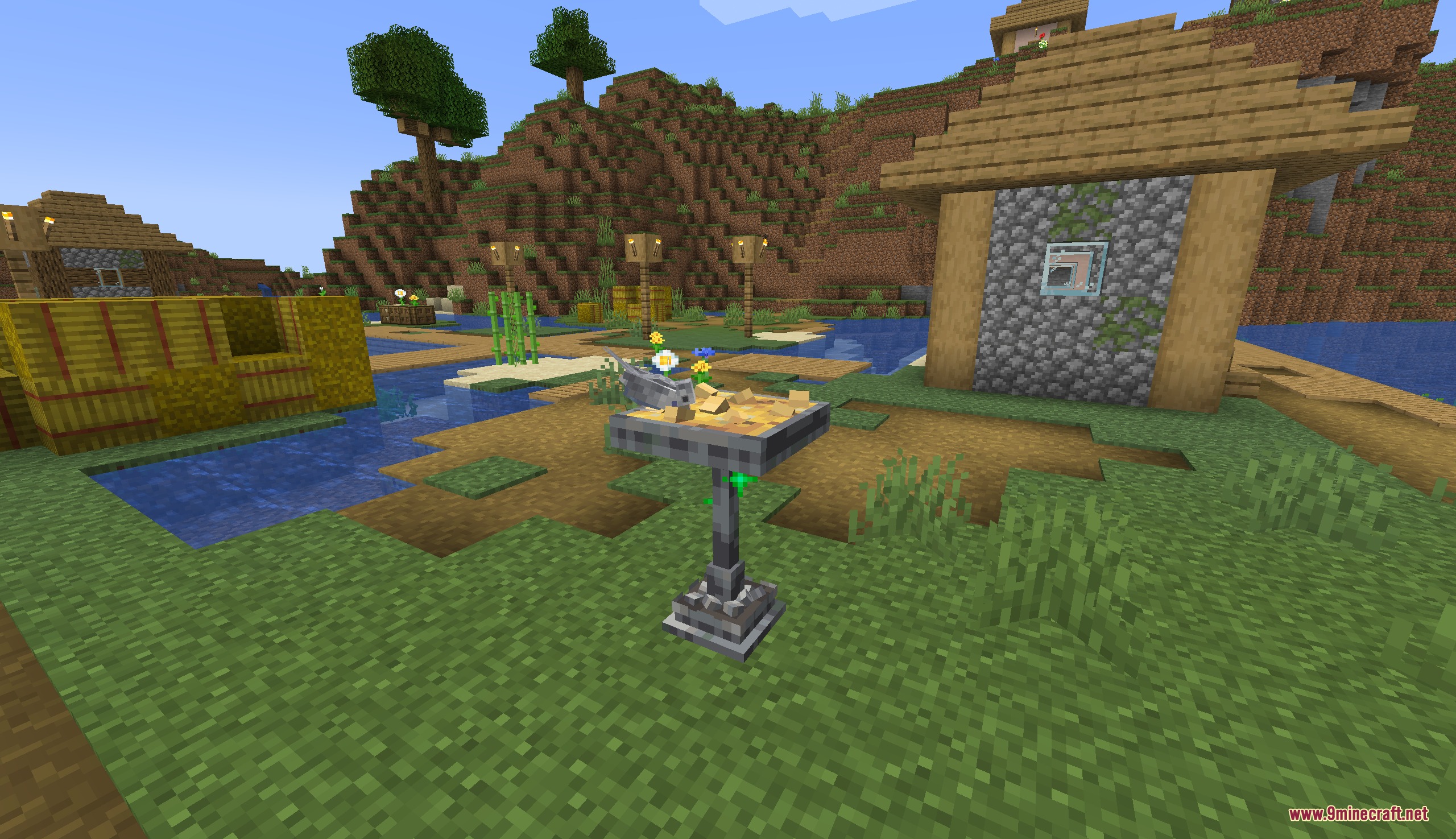 Wildwing Chronicles Mod Screenshot 4 A birdbath from Wildwing Chronicles Mod attracts birds in a village