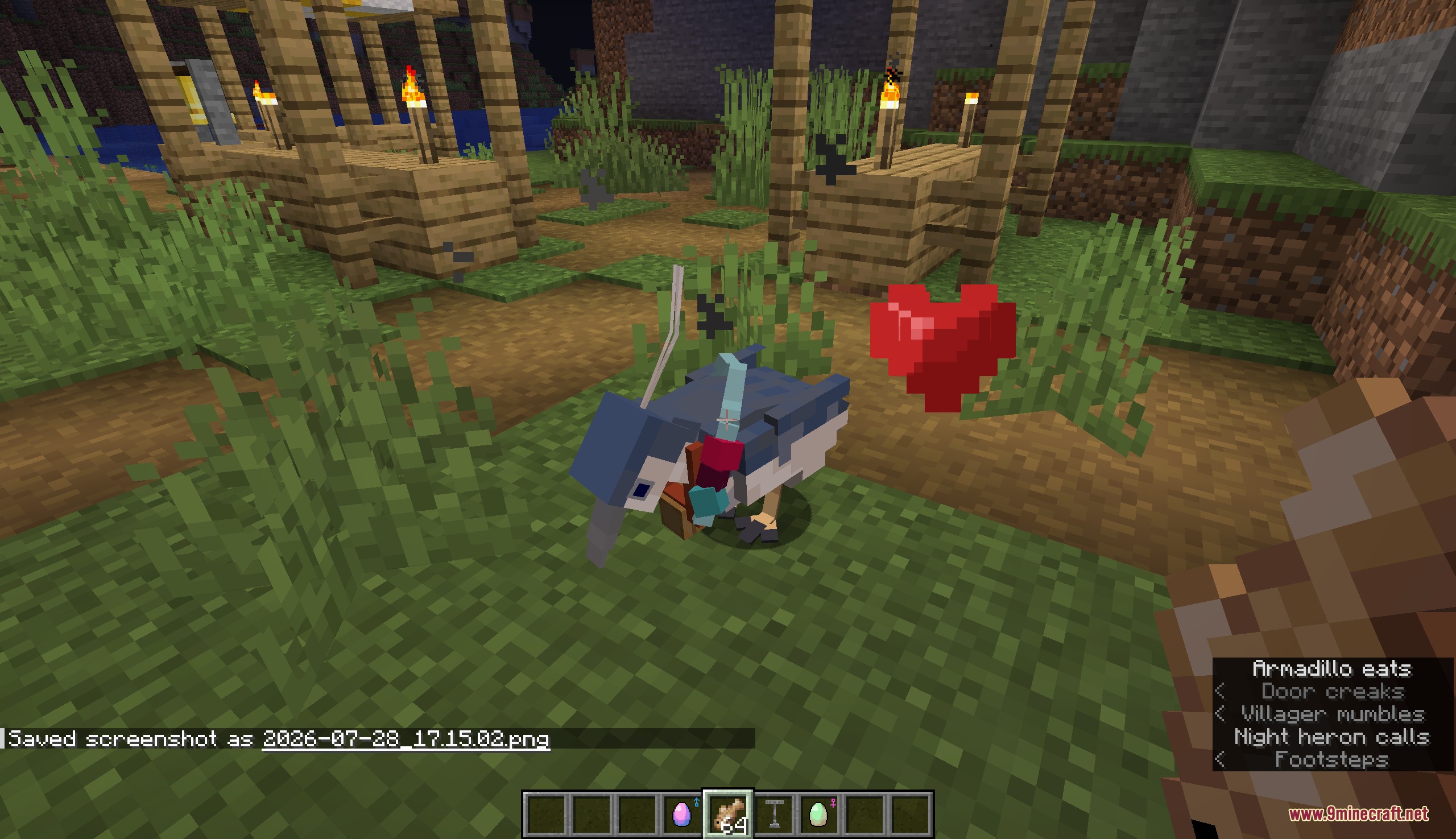 Wildwing Chronicles Mod Screenshot 5 A blue Night Heron bird shows a heart while being tamed in Minecraft