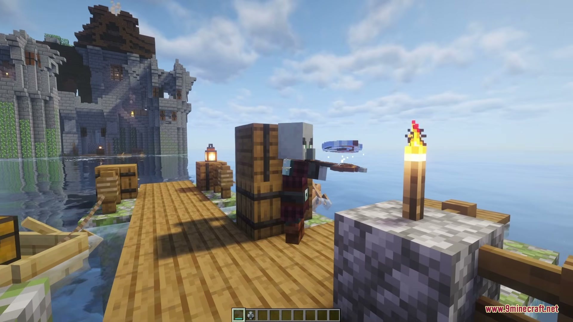 Wind Boomerang Mod Screenshot 7 An Illager throwing a blue wind boomerang from a wooden dock