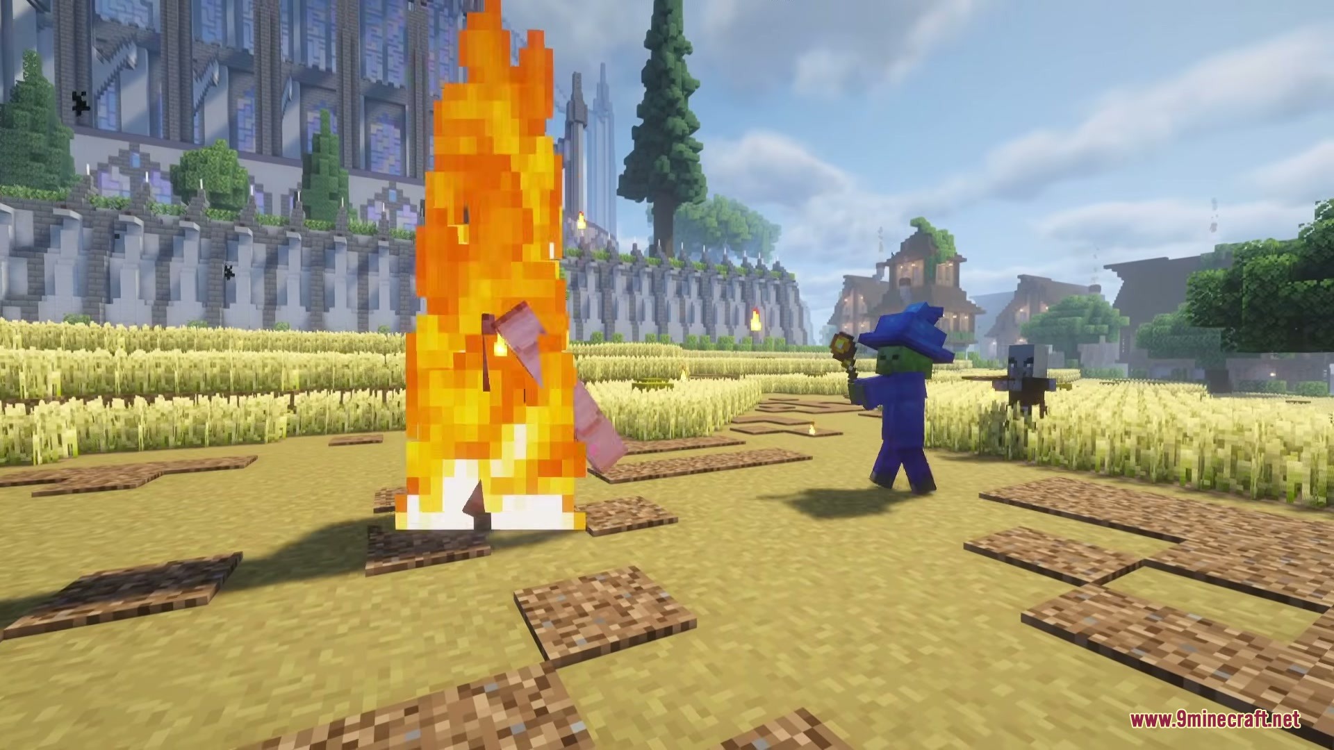 Wizard Mobs Mod Screenshot 8 A zombie wizard using a magic staff to set another mob on fire