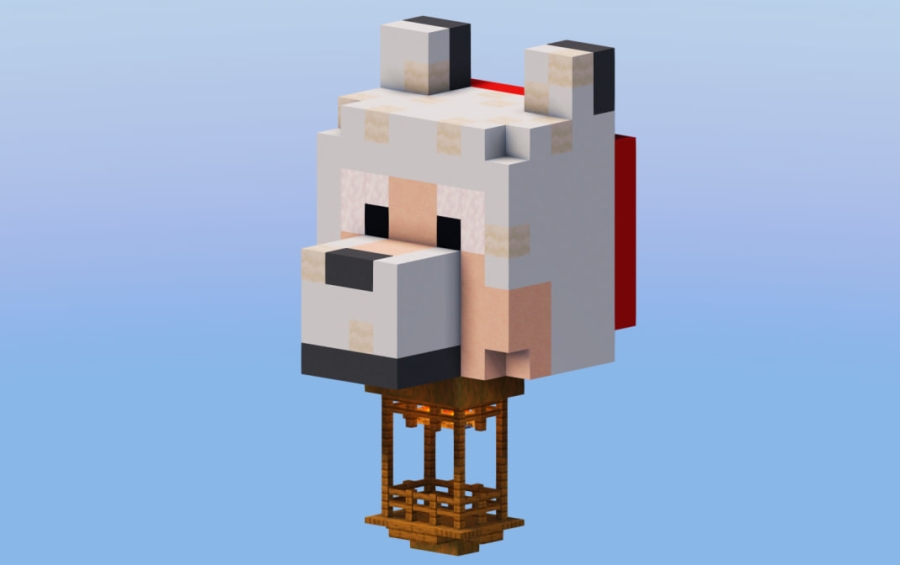 The white wolf head hot air balloon features a detailed wooden basket underneath