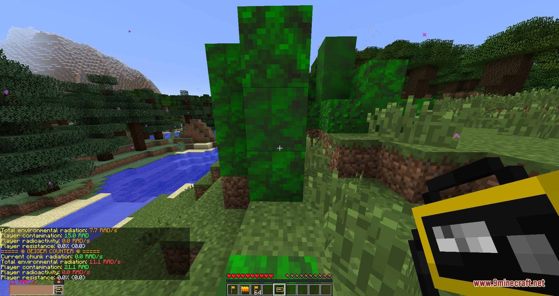 Xeno Factions by RagexPrince683 Mod Screenshot 7 Player holding a Geiger counter to monitor radiation levels in a forest