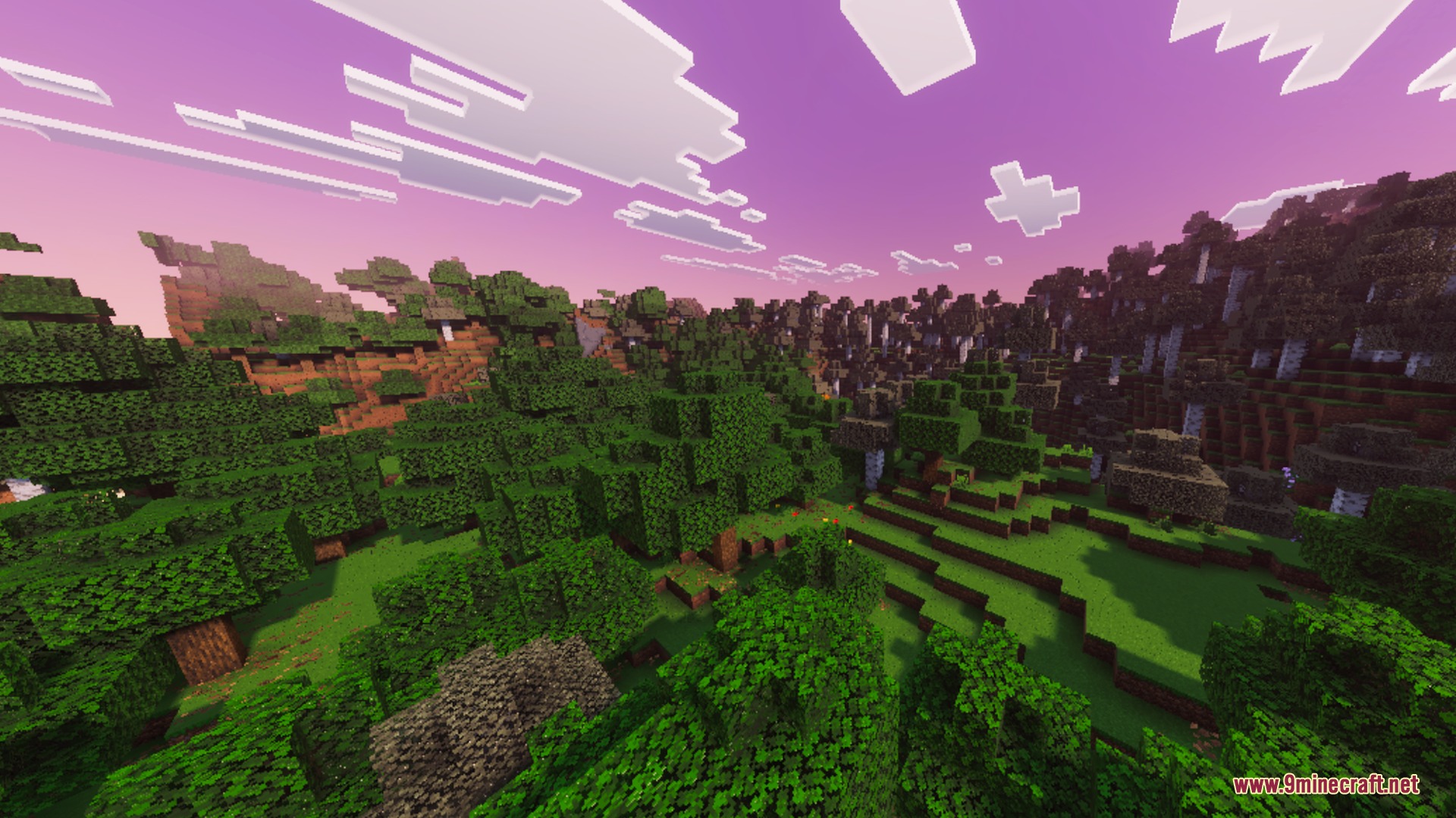 A lush green forest landscape under a purple and pink sunset sky