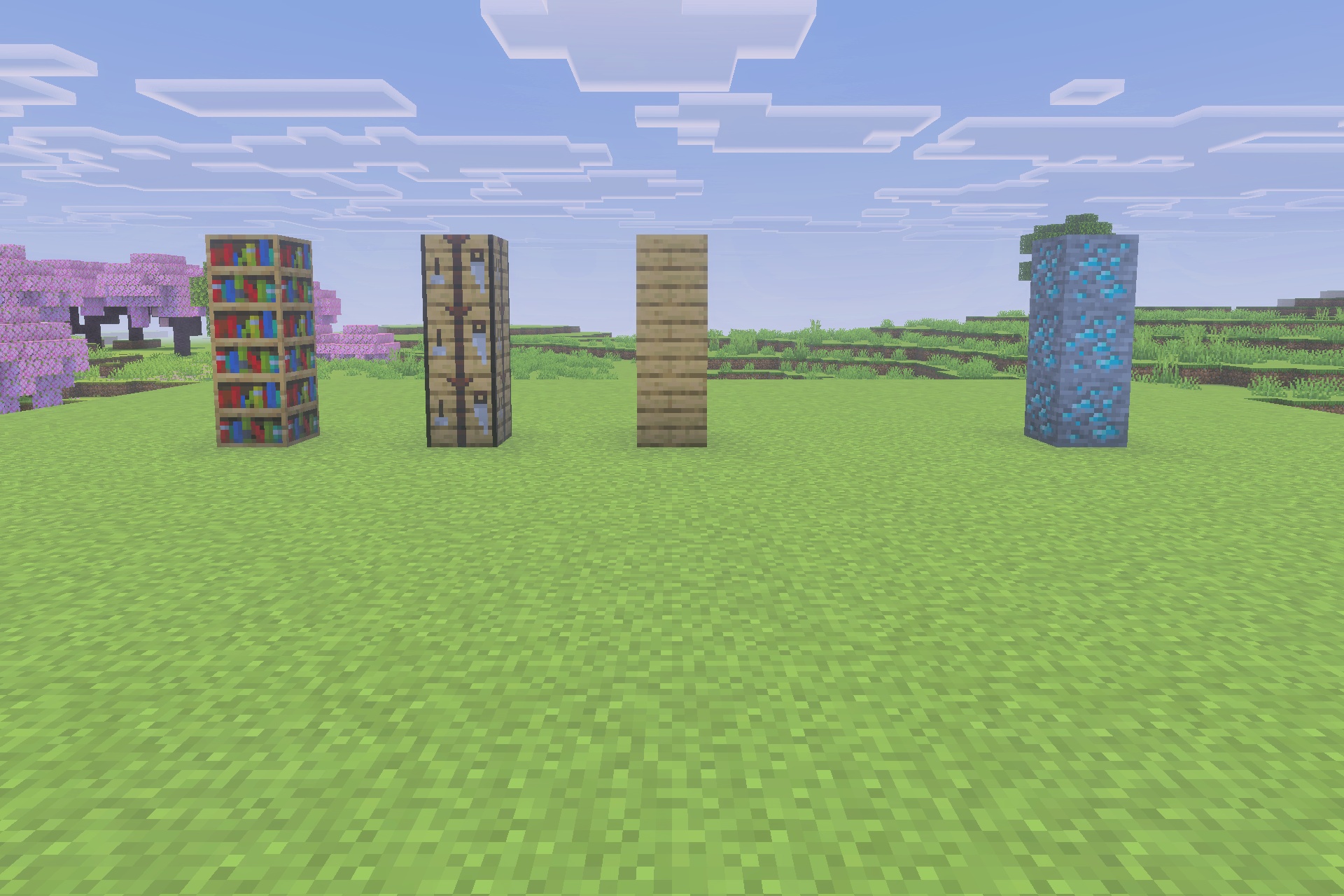 Xnova Remastered Texture Pack Screenshot 4 Four pillars of detailed 3D Minecraft blocks standing on a grassy field