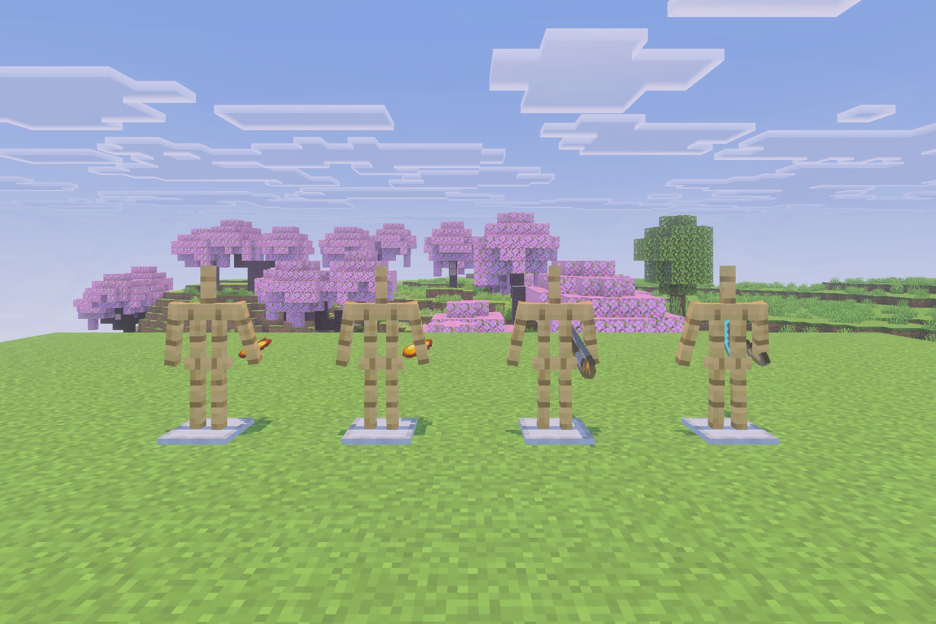 Xnova Remastered Texture Pack Screenshot 5 Armor stands showcasing detailed 3D item models in a cherry blossom biome