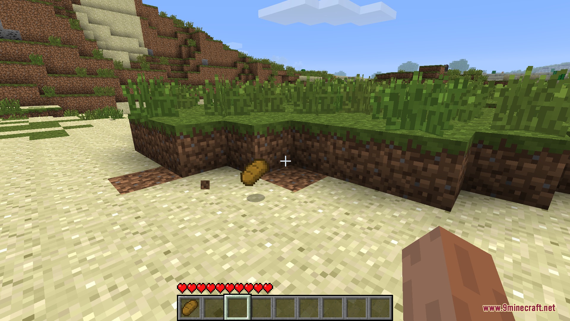 Yeasty Everything Mod Screenshot 1 A loaf of bread floats above the ground in a Minecraft world