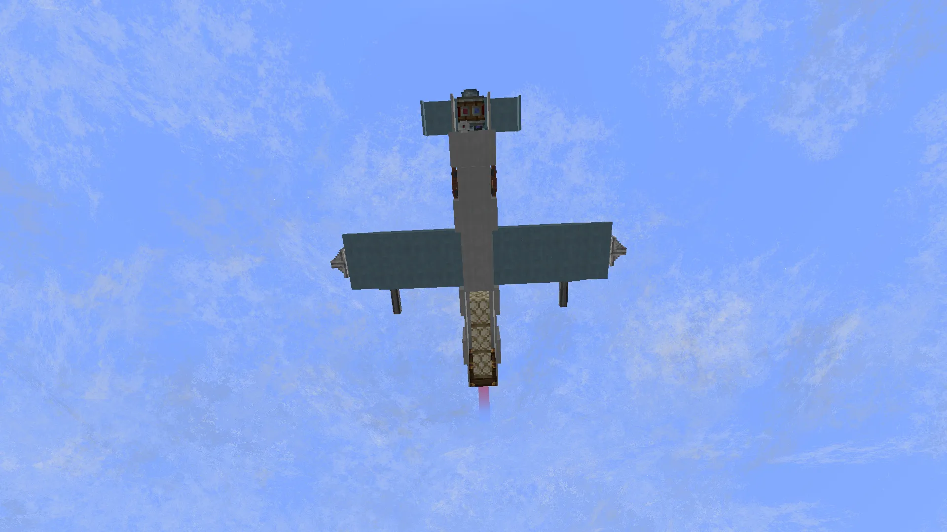 Bottom view of a small Minecraft aircraft flying through the blue sky