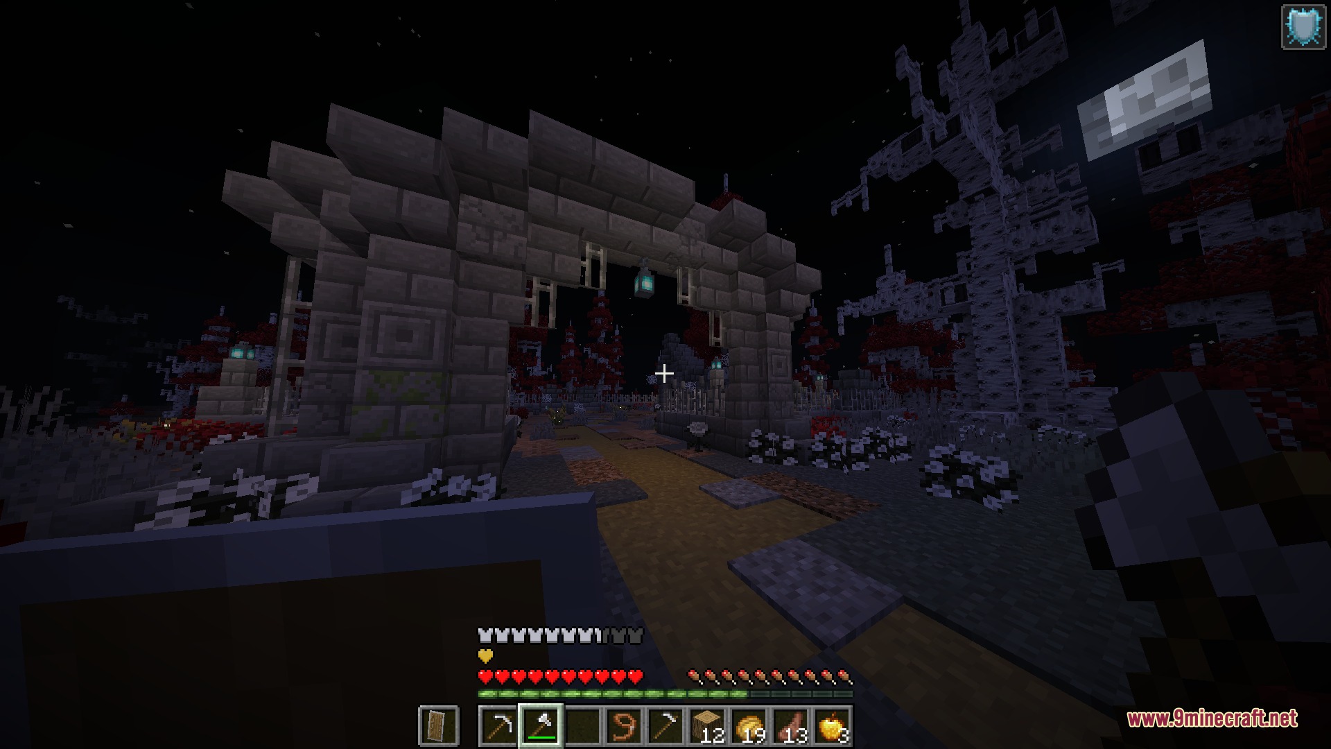 Zedonho Mod Screenshot 3 A stone gate leads into a dark haunted forest biome at night