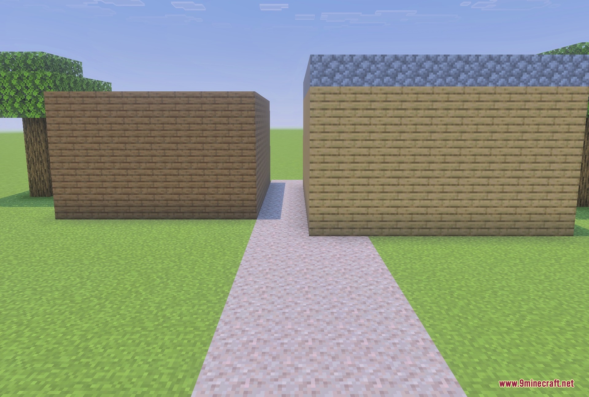 Oak and spruce houses along a gravel path