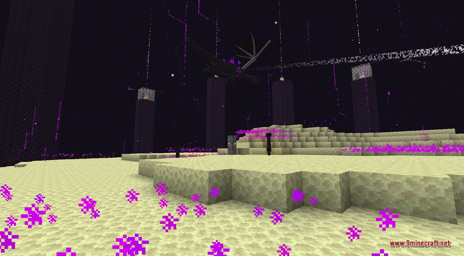A wide view of the reworked dragon soaring against the dark End sky, wings spread, as beams and glowing particles from its attacks trail across the arena