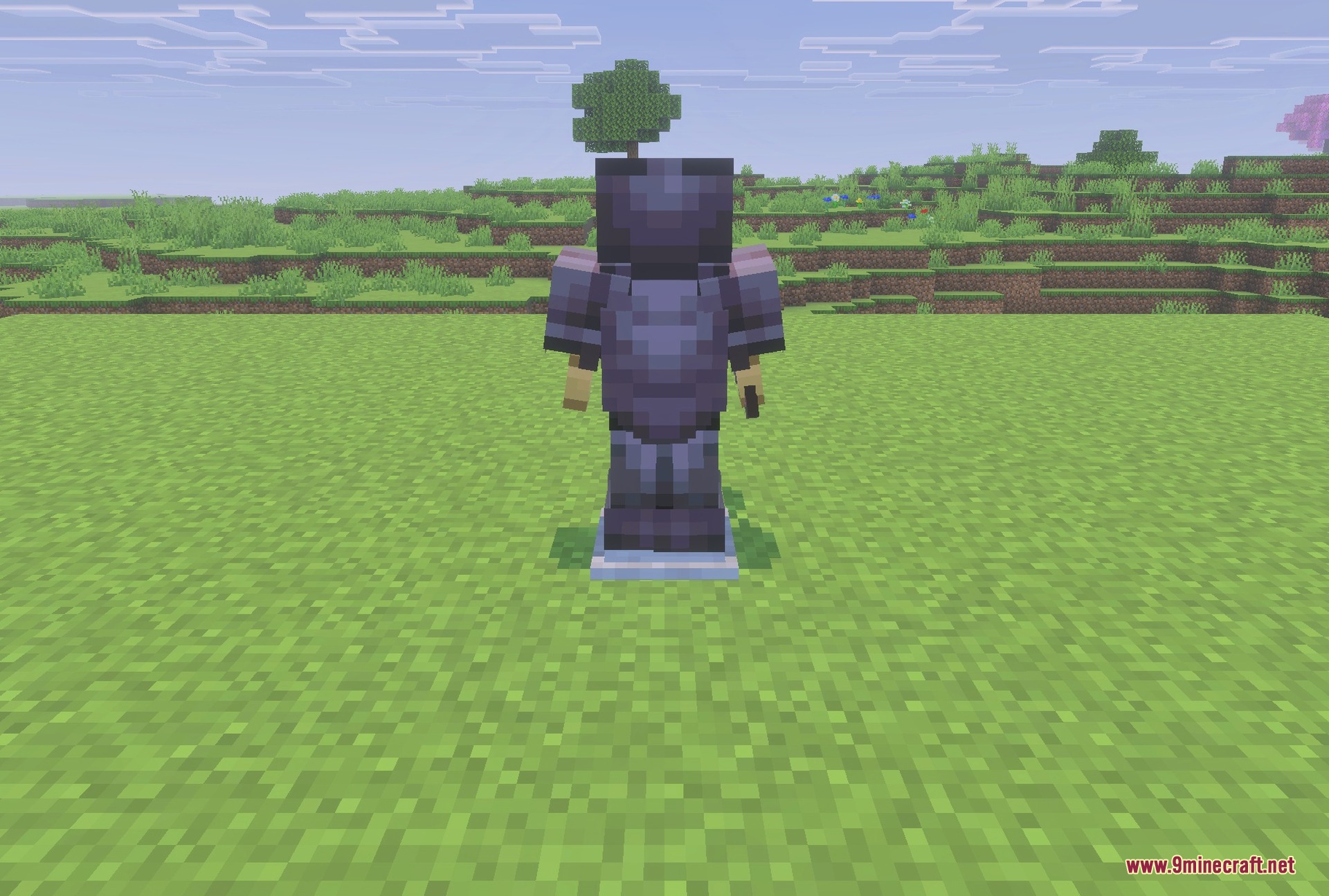 Ultimate Hammers Gravel's Addon Screenshot 3 The Netherite Hammer held next to a full netherite kit