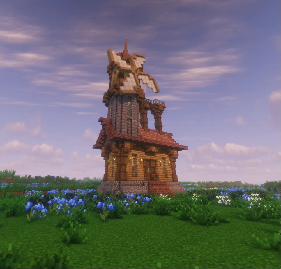 A cozy Minecraft house with a windmill tower standing in a flower field