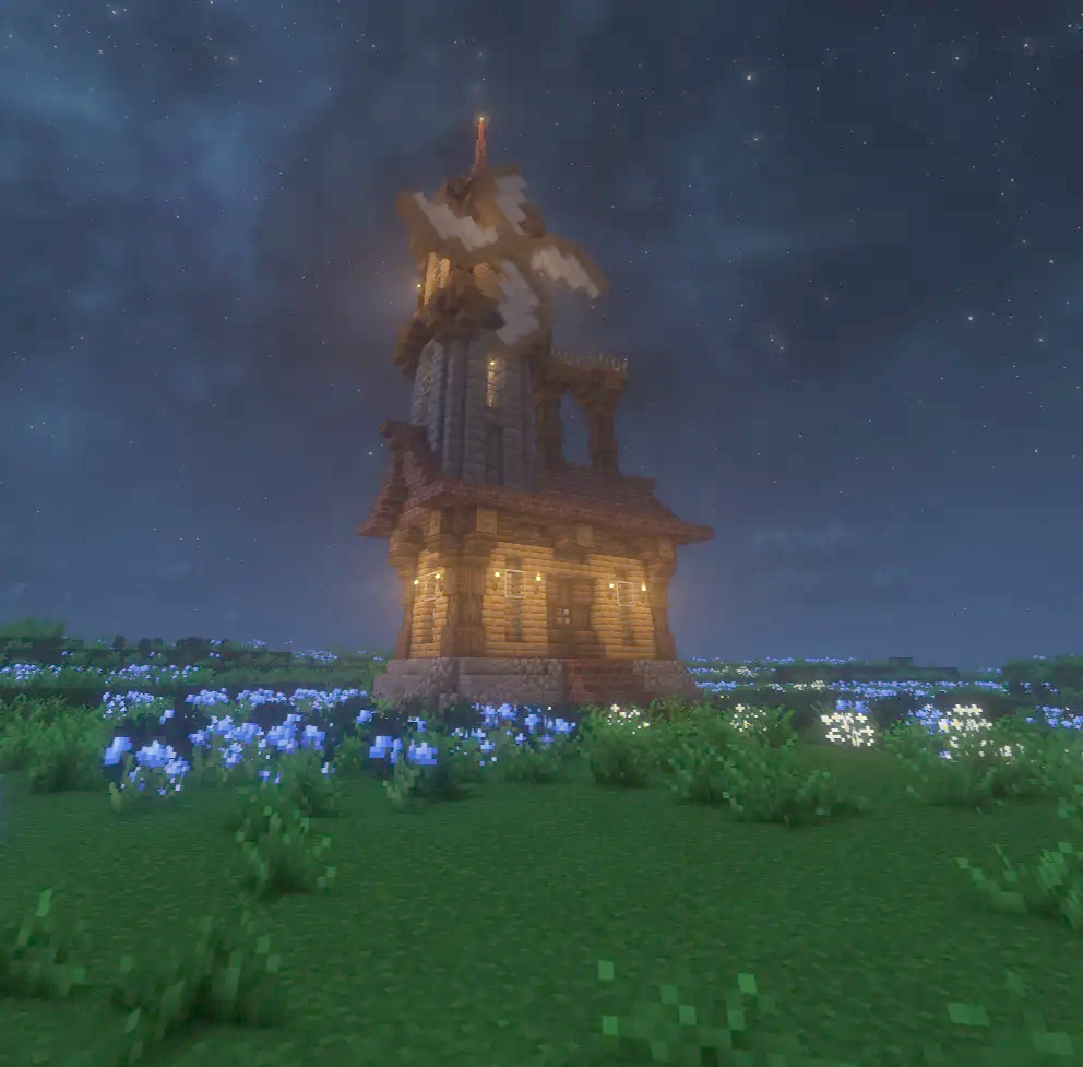 The windmill house glowing with warm lanterns under a starry night sky