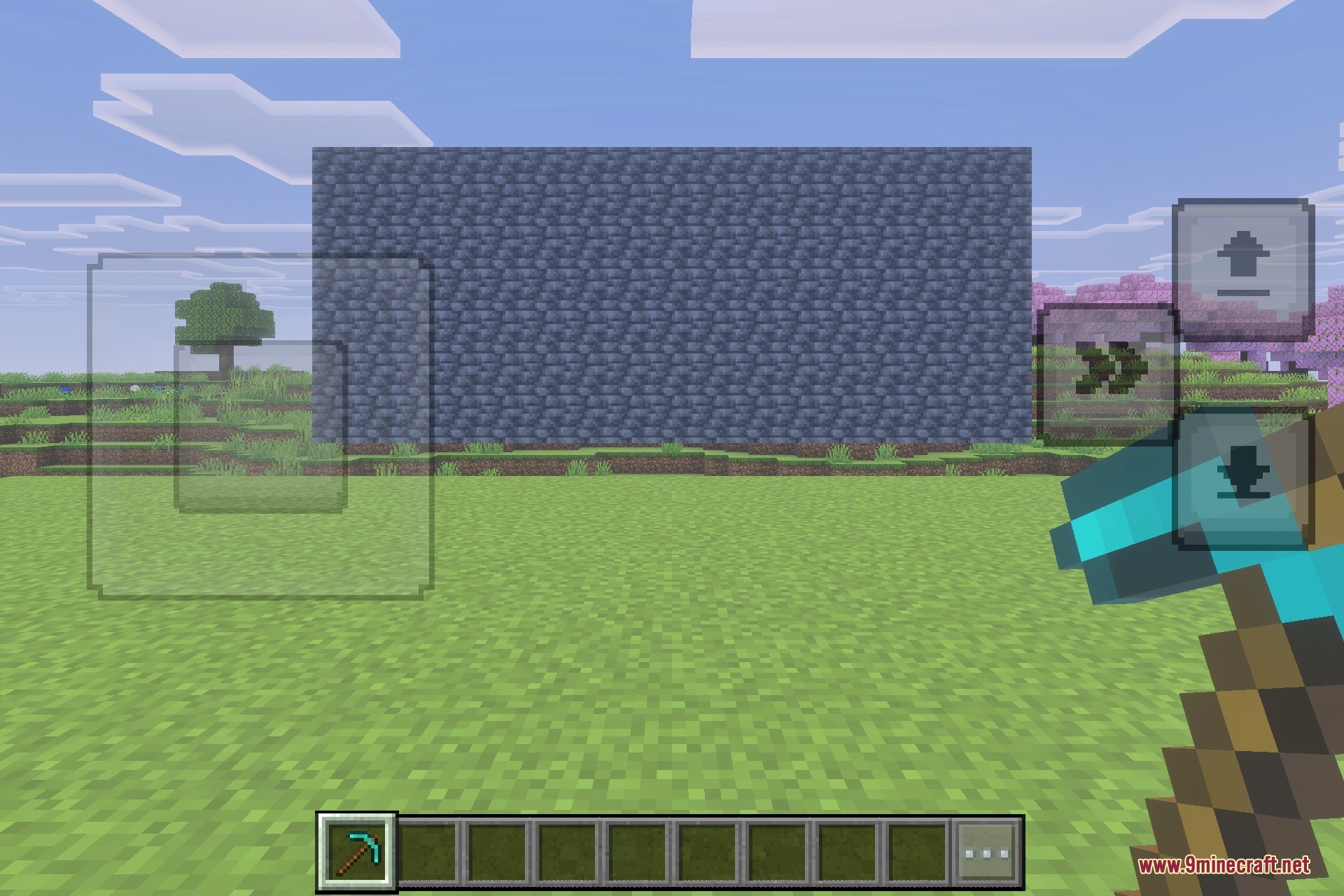 Player holding a diamond pickaxe in front of a large deepslate brick wall