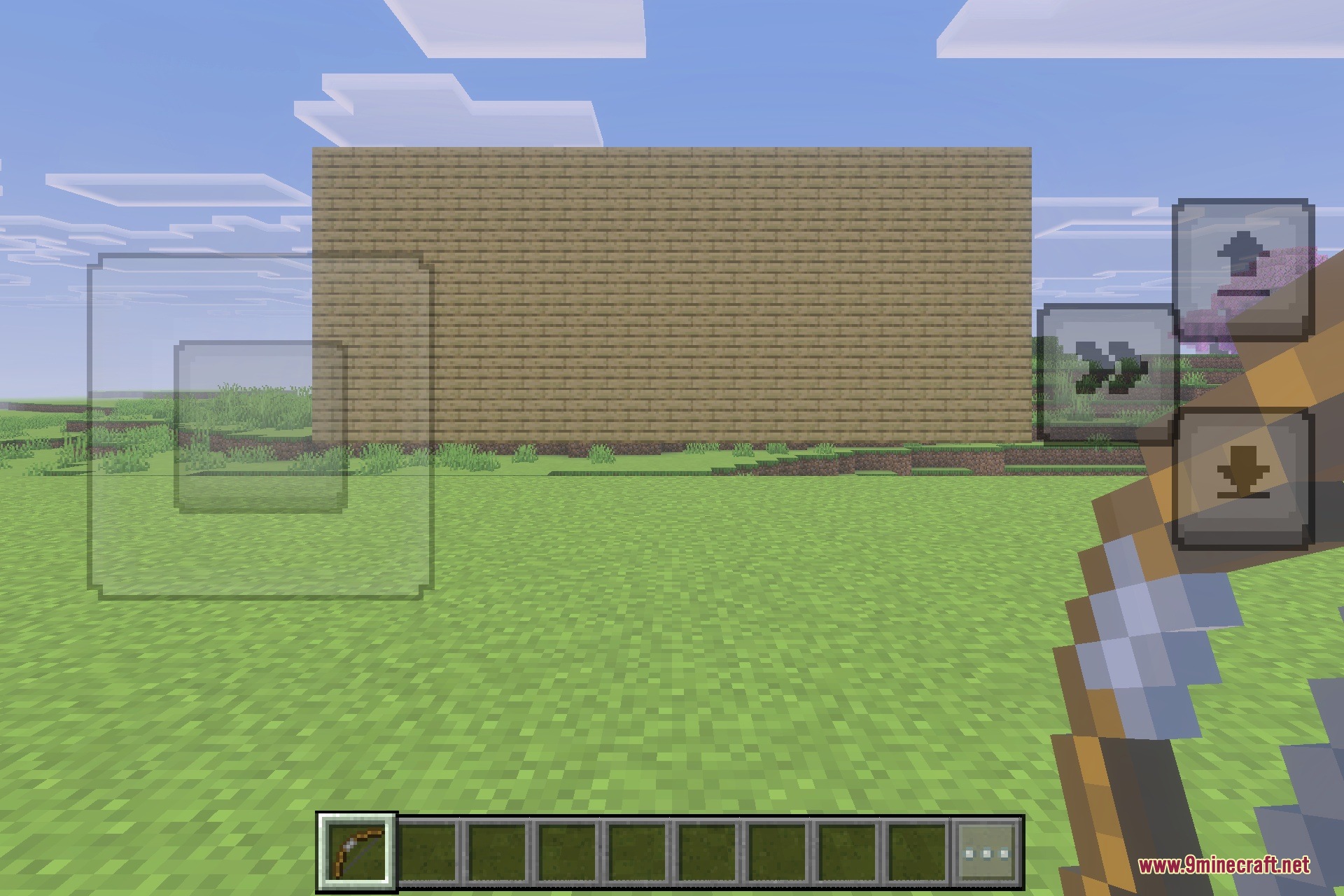 A player holding a bow in front of a large wooden wall