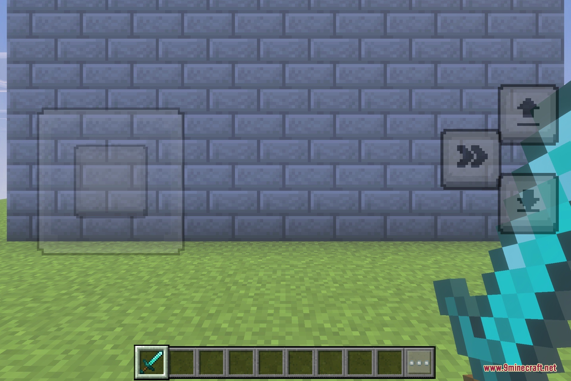First person view showing a diamond sword and armor sleeves on the arms