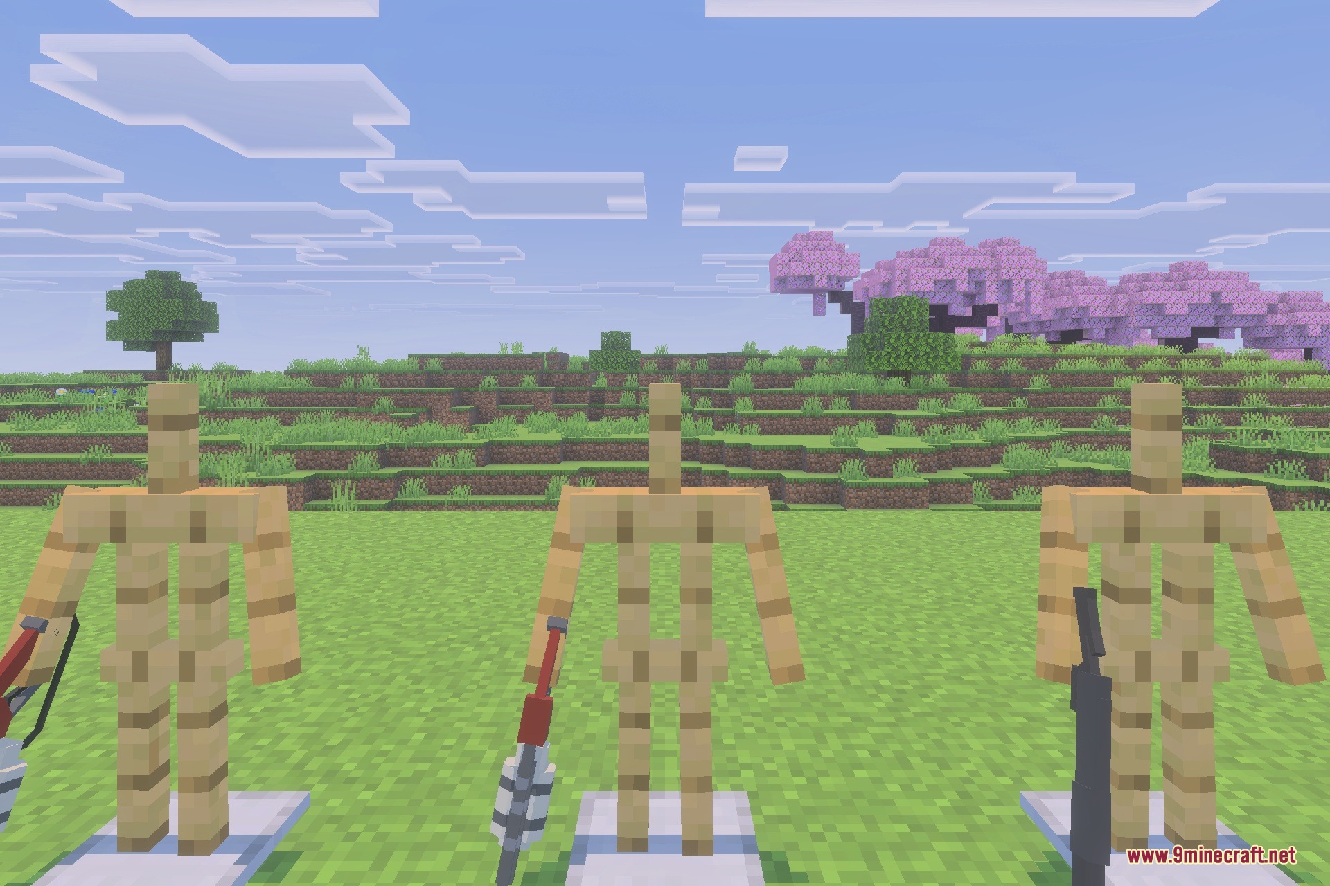Three armor stands displaying custom weapons in a scenic cherry blossom biome