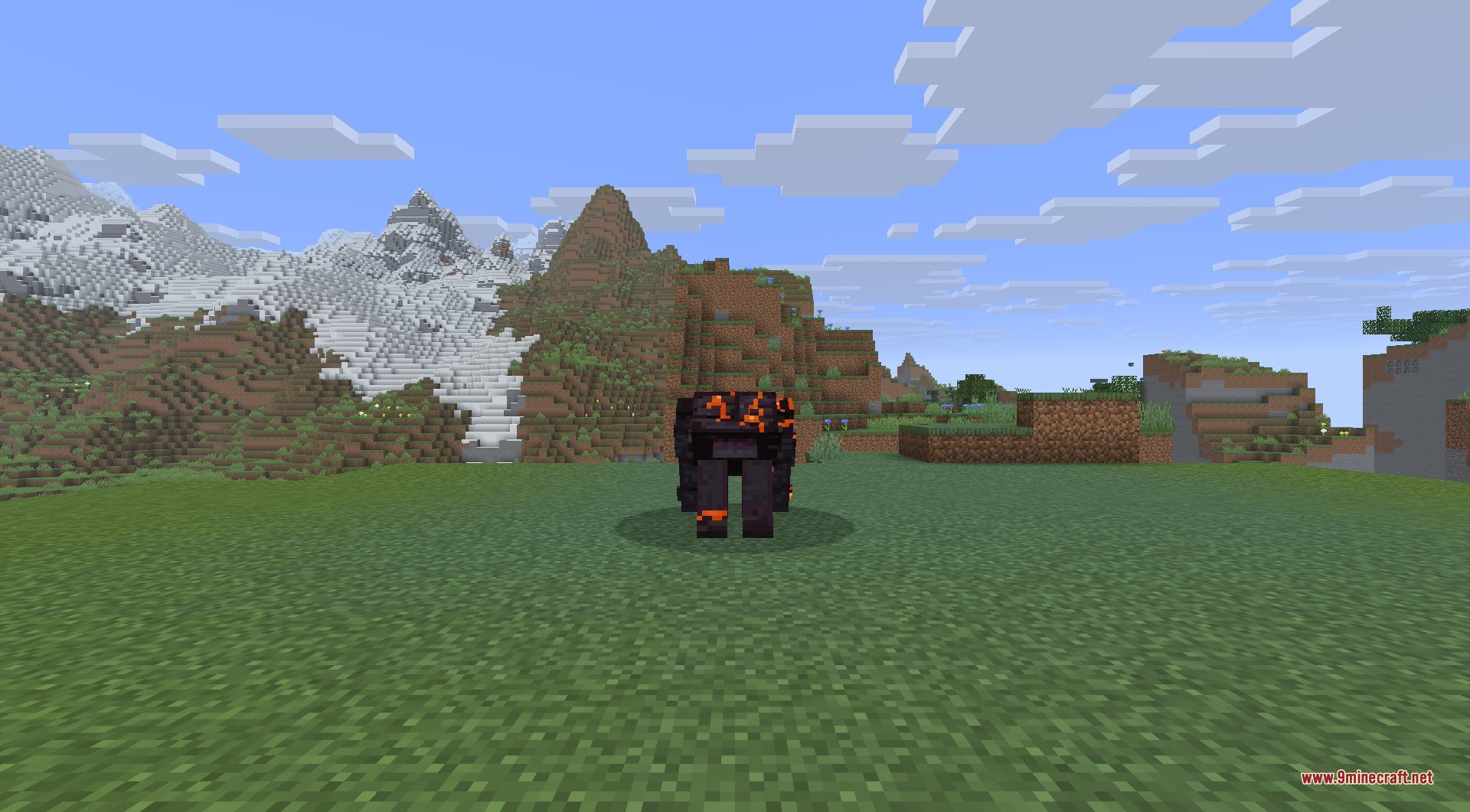 AdventureZ 9minecraft Mod Screenshot 3 A powerful Blackstone Golem stands in a field with snowy mountains behind it