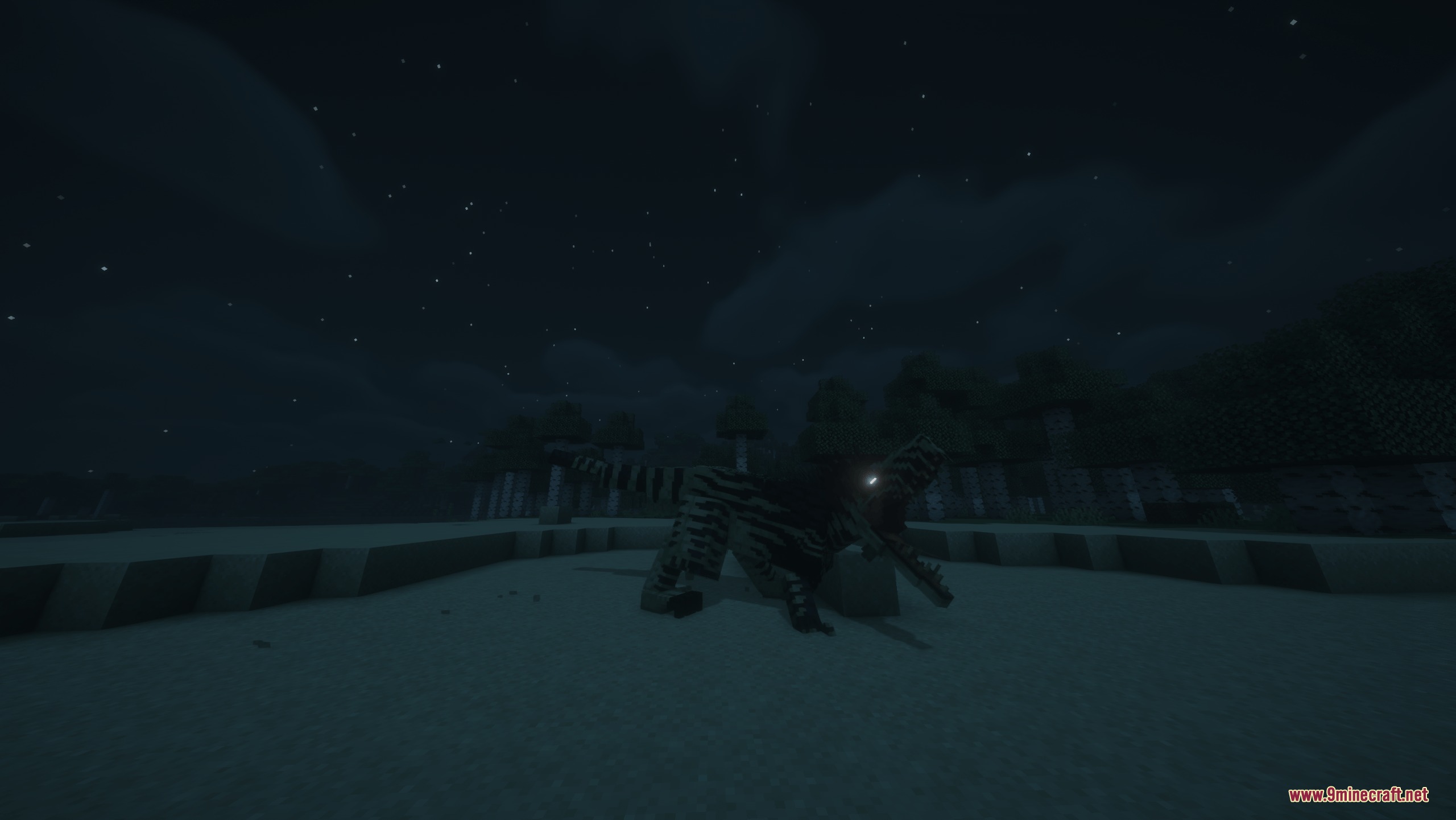A striped Megaraptor with glowing eyes stands in a dark night field