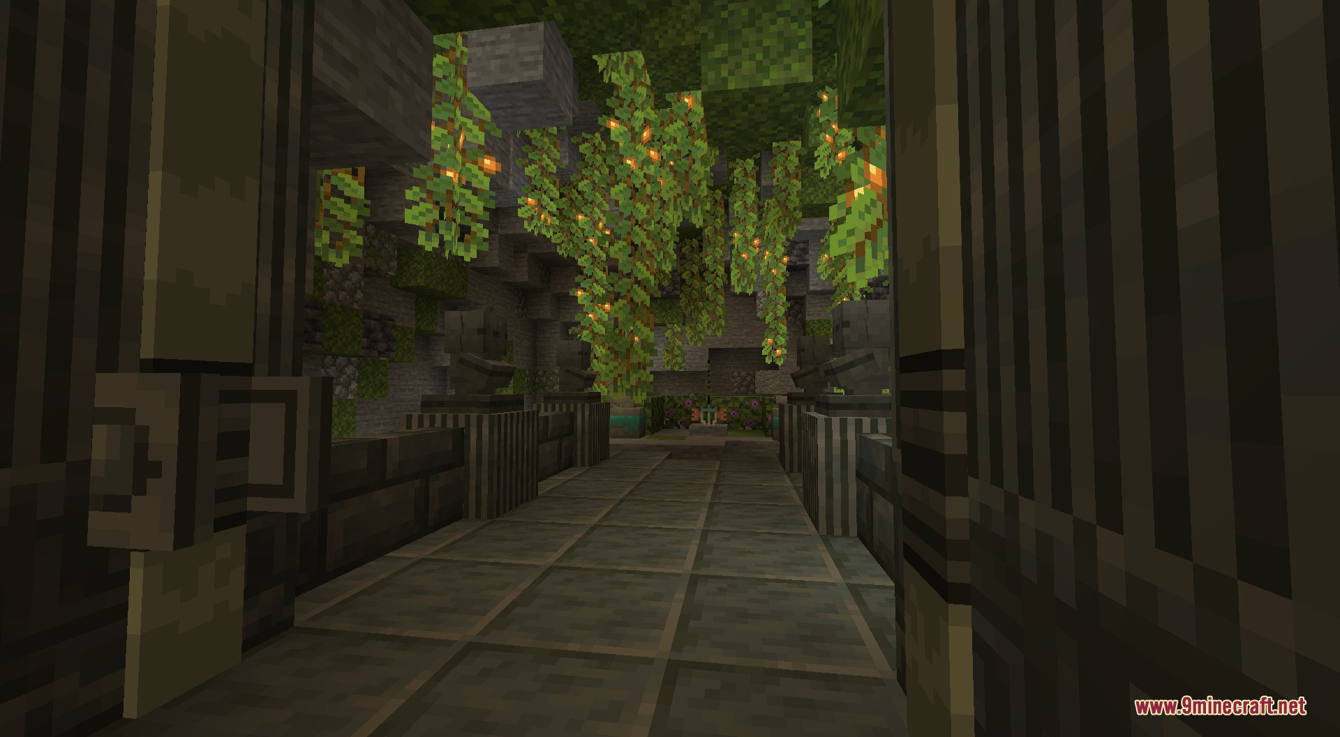 Amphibian Fallen Empire Mod Screenshot 4 Ancient stone ruins with hanging glow berries and statues in a lush cave