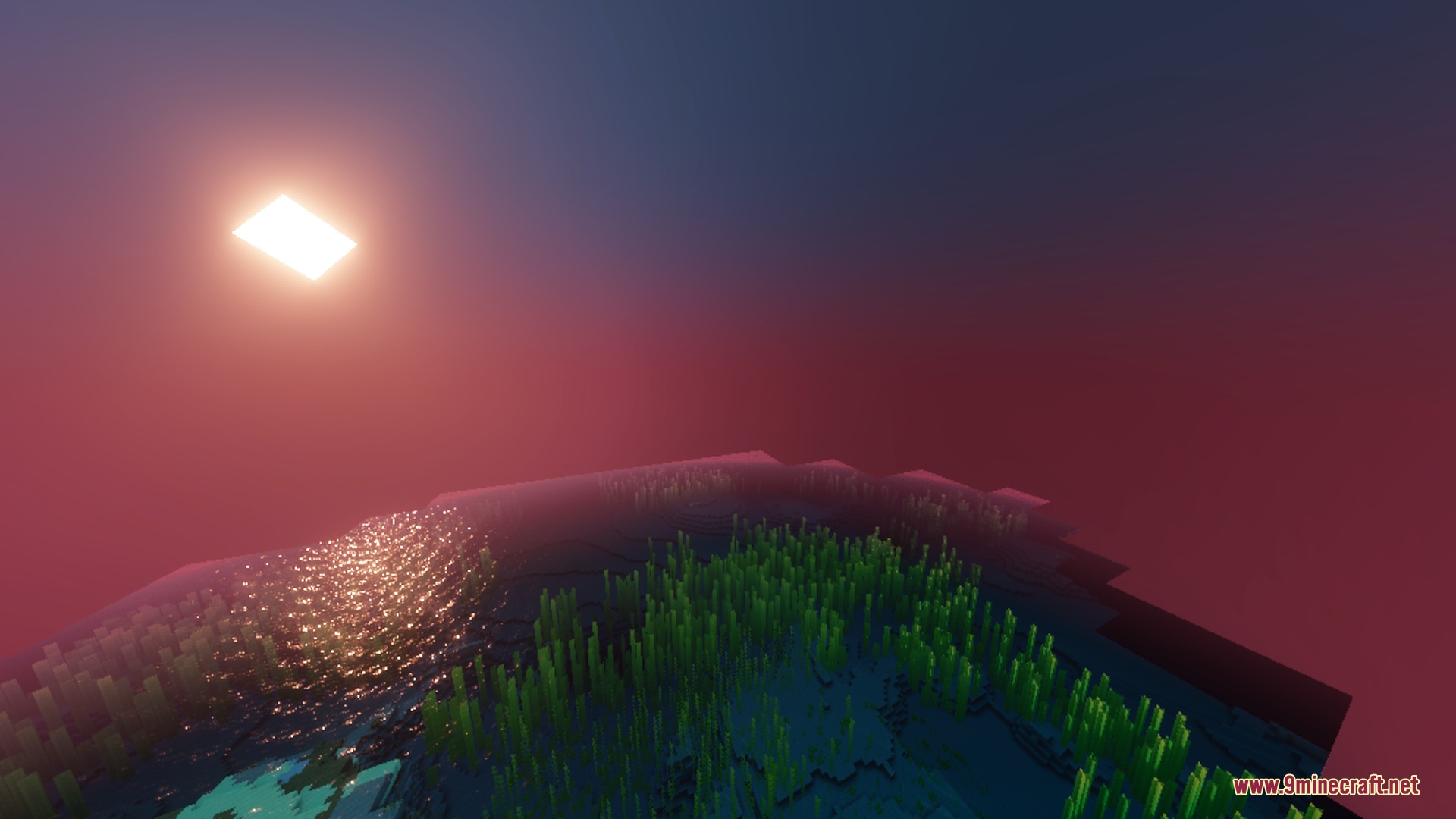 Vibrant fantasy lighting illuminates a field of seagrass under a deep red sunset