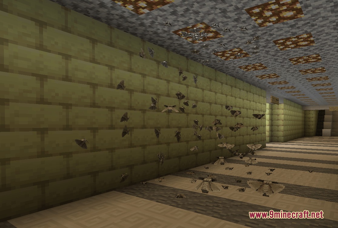 A swarm of grey dust moths flying in a yellow brick hallway