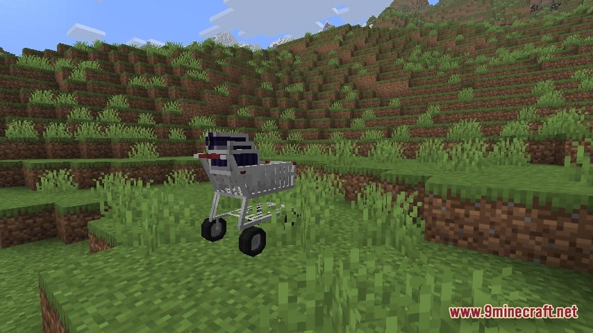 Automobility 9minecraft Mod Screenshot 4 A shopping cart vehicle with black wheels sitting in a grassy field