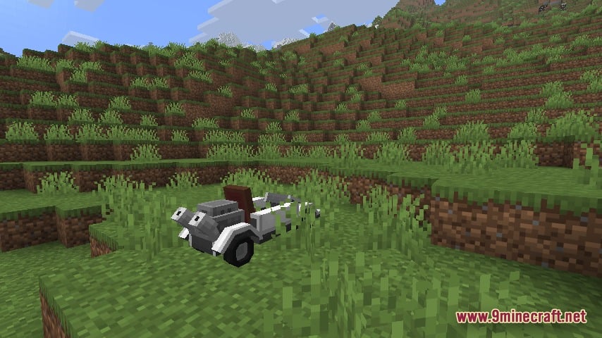Automobility 9minecraft Mod Screenshot 5 A small white car parked on a grassy hill in Minecraft