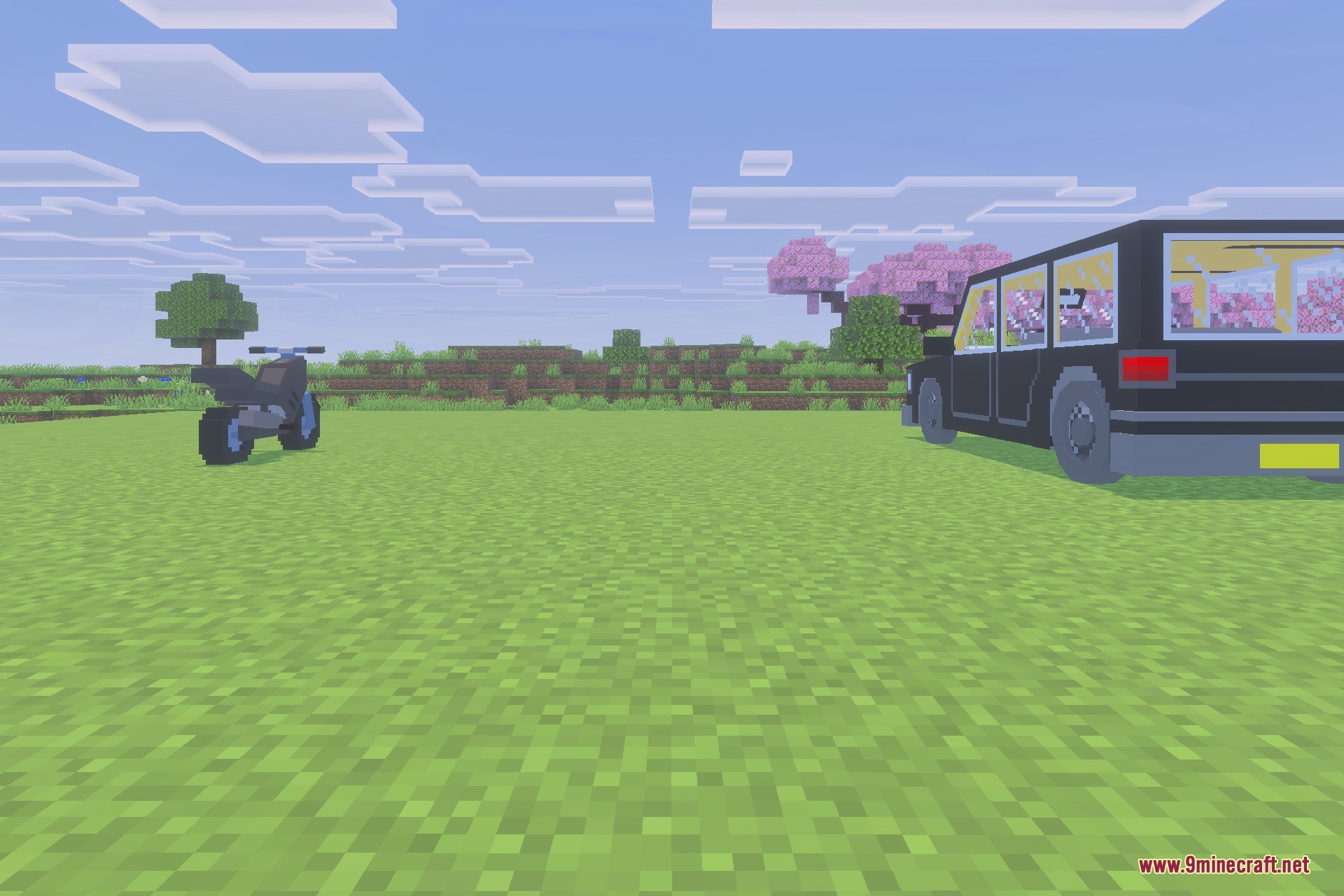 Backrooms - SankoRooms Addon Screenshot 2 A motorcycle and a black car parked on a green grass field