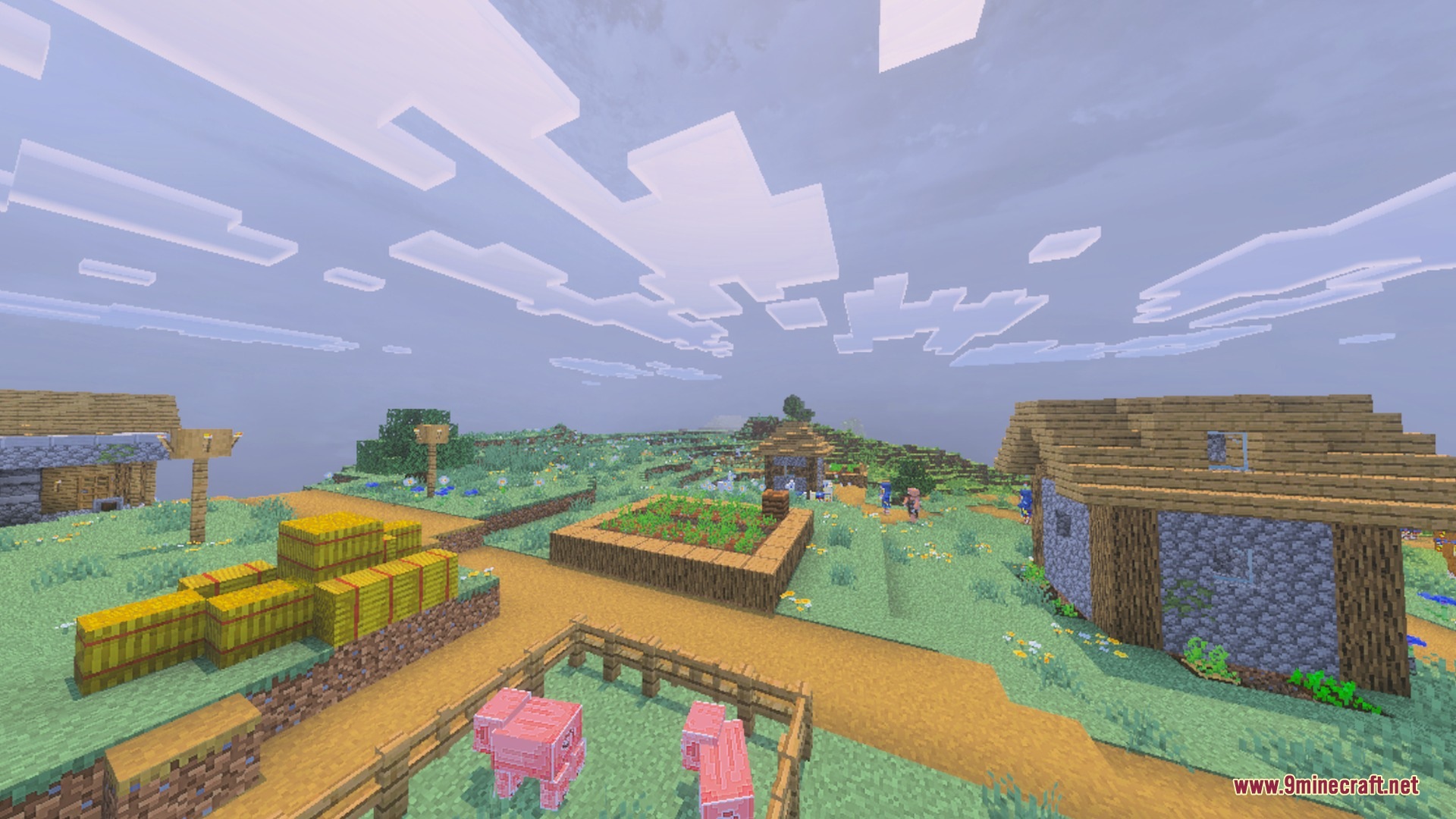 A peaceful village with hay bales and pigs under a clean custom sky