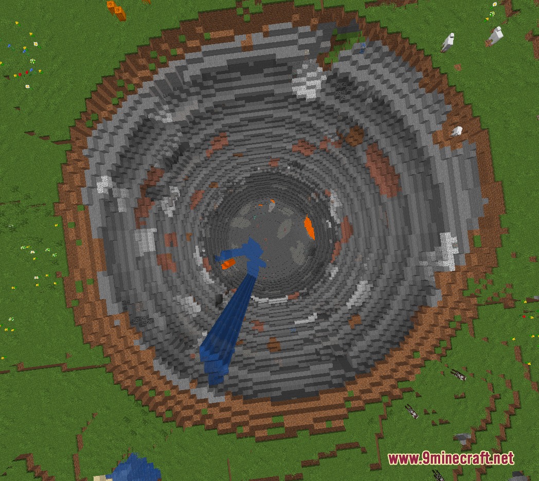 Calamity Royale Mod Screenshot 7 A massive circular sinkhole crater carved deep into the grassy Minecraft terrain