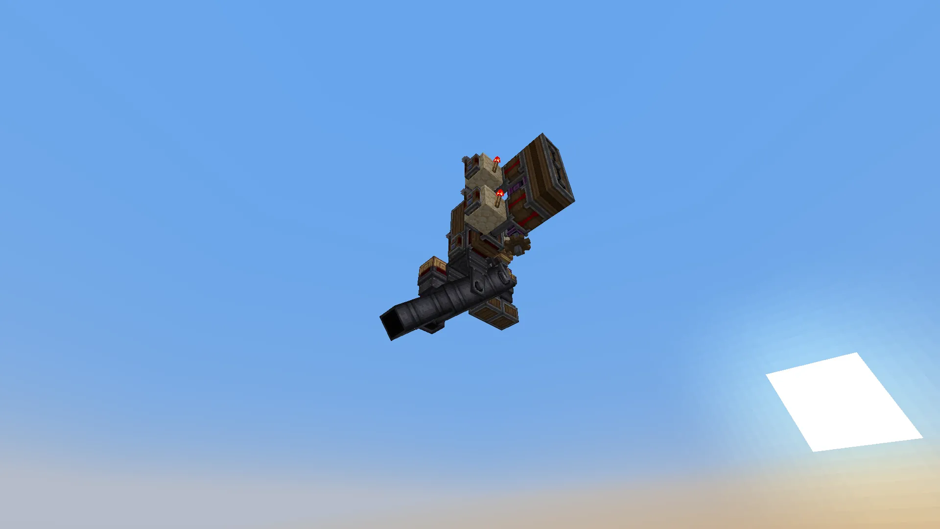 Side view of a redstone powered cannon remote control floating in the sky