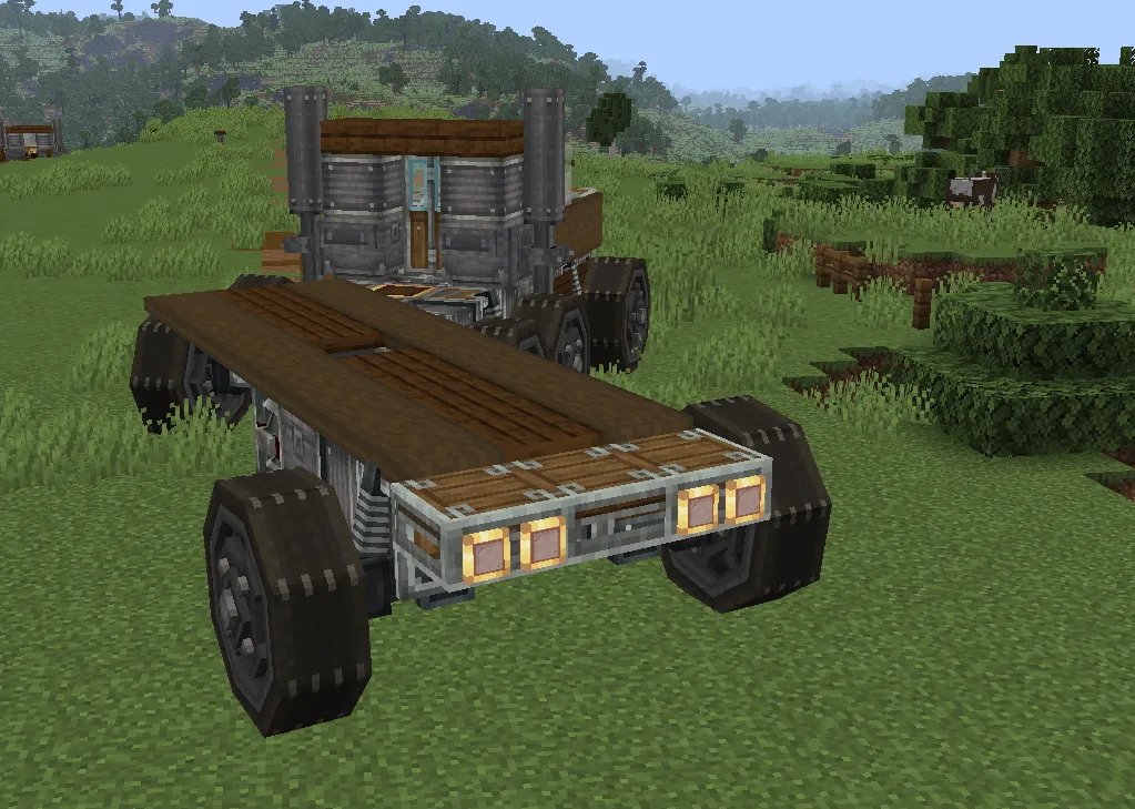 Rear view of the truck showing its wooden flatbed and large wheels