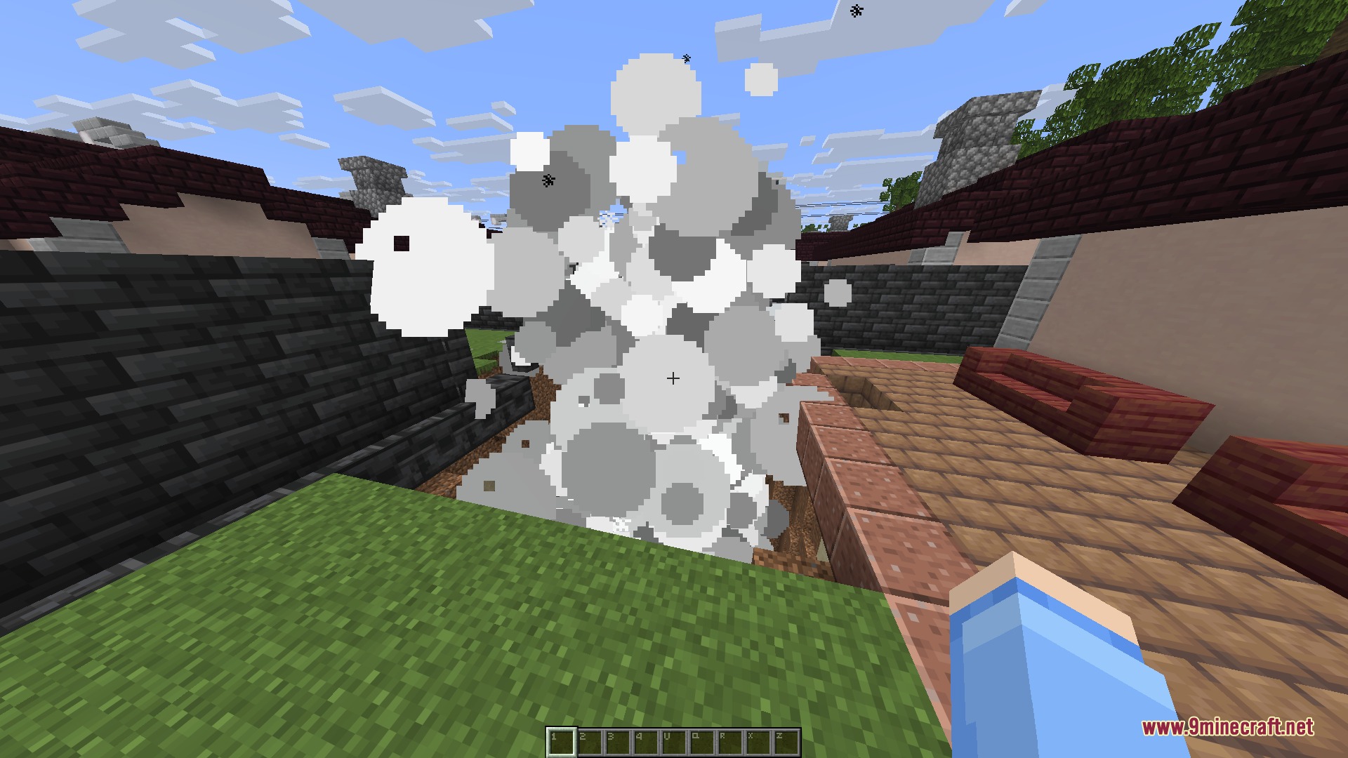 Celestial Artillery Zenith Mod Screenshot 4 Massive smoke particles from a powerful TNT explosion in a Minecraft courtyard