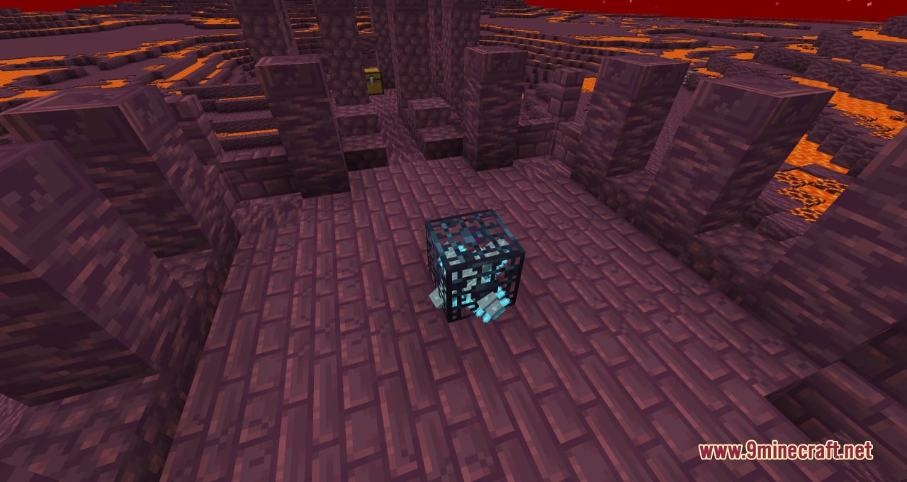 A blue monster spawner sits on nether bricks in a lava filled dimension