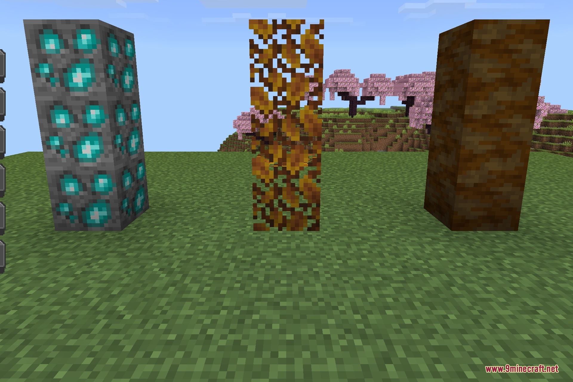 CobbleDrock 1.2.3 Gym Challenge Update Addon Screenshot 6 Custom blocks and ores displayed as vertical pillars in a grassy field