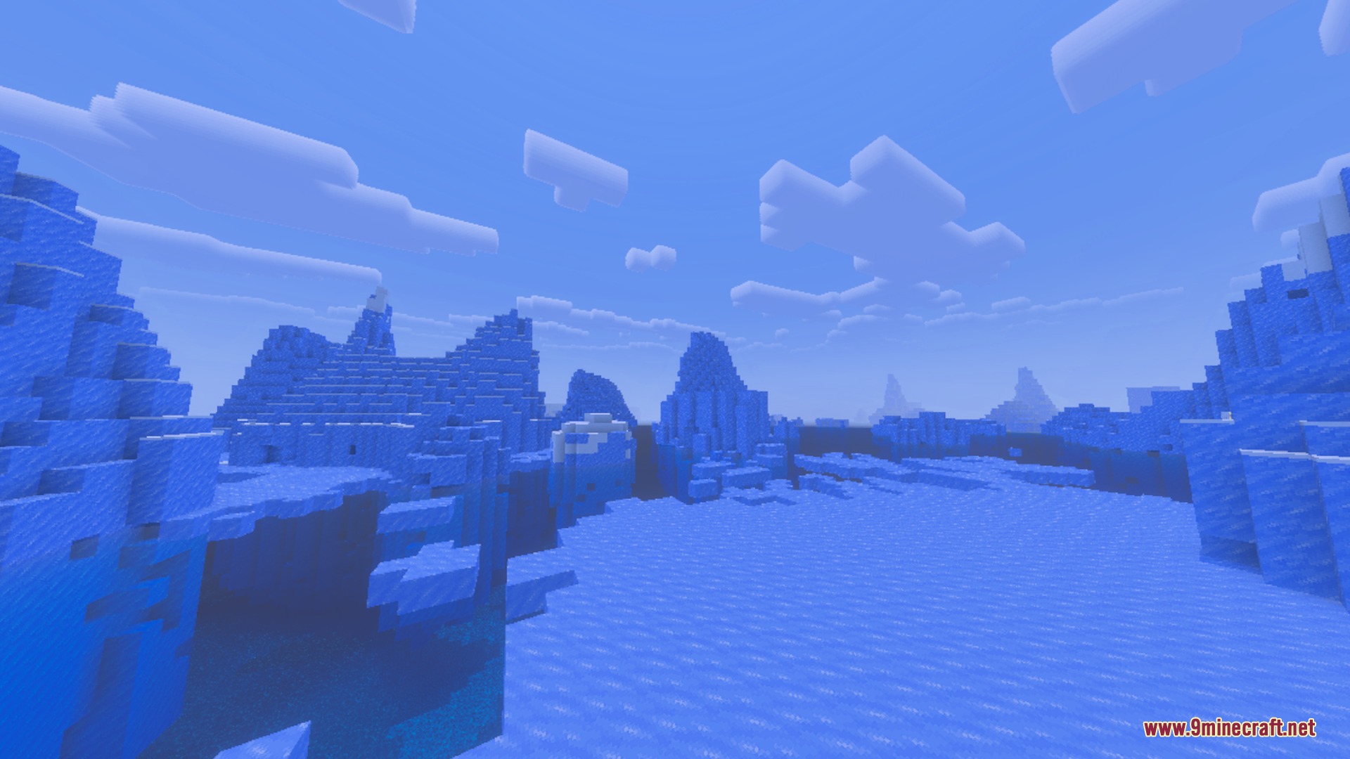 Bright blue sky with blocky clouds over a frozen ice spike biome